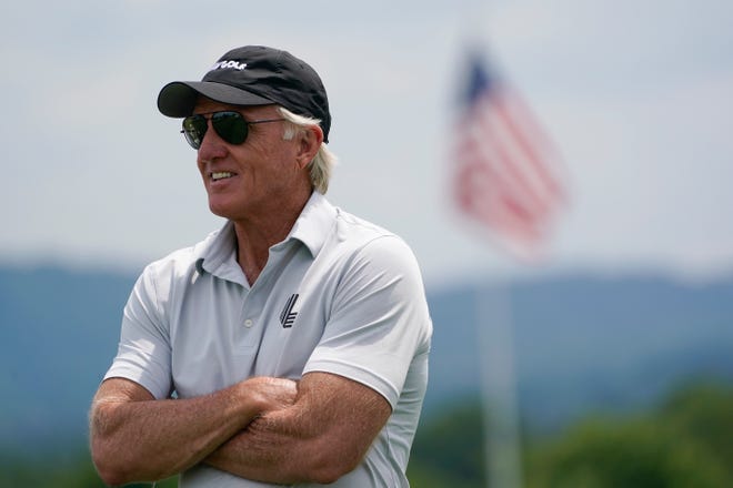 FILE - LIV Golf CEO and Commissioner Greg Norman watches play during the pro-am of the Bedminster Invitational LIV Golf tournament in Bedminster, NJ, July 28, 2022. Rory McIlroy thought his differences with Norman over a Saudi-funded golf league had been patched up. That changed when Norman accused him of being