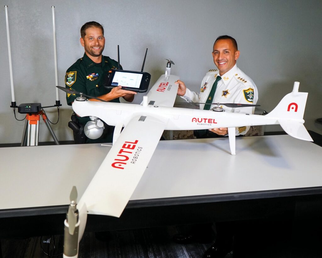 Lee County Sheriff Carmine Marceno (right) demonstrates the agency’s new “Dragonfish” drone. LCSO uses this and other technologies to help search for missing persons. COURTESY AUTEL ROBOTICS