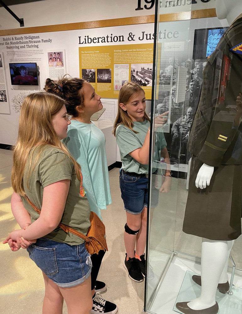 Camryn Pierce, Journey Cook and Kambrie Karvis, students from a homeschool student group, view exhibits during a visit to the museum. COURTESY PHOTO / THE HOLOCAUST MUSEUM AND COHEN EDUCATION CENTER OF SOUTHWEST FLORIDA