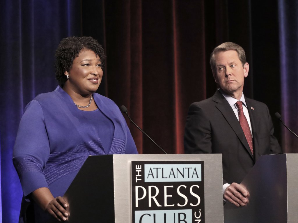 National politics, career arcs explain why Georgia's Kemp polls ahead of Abrams