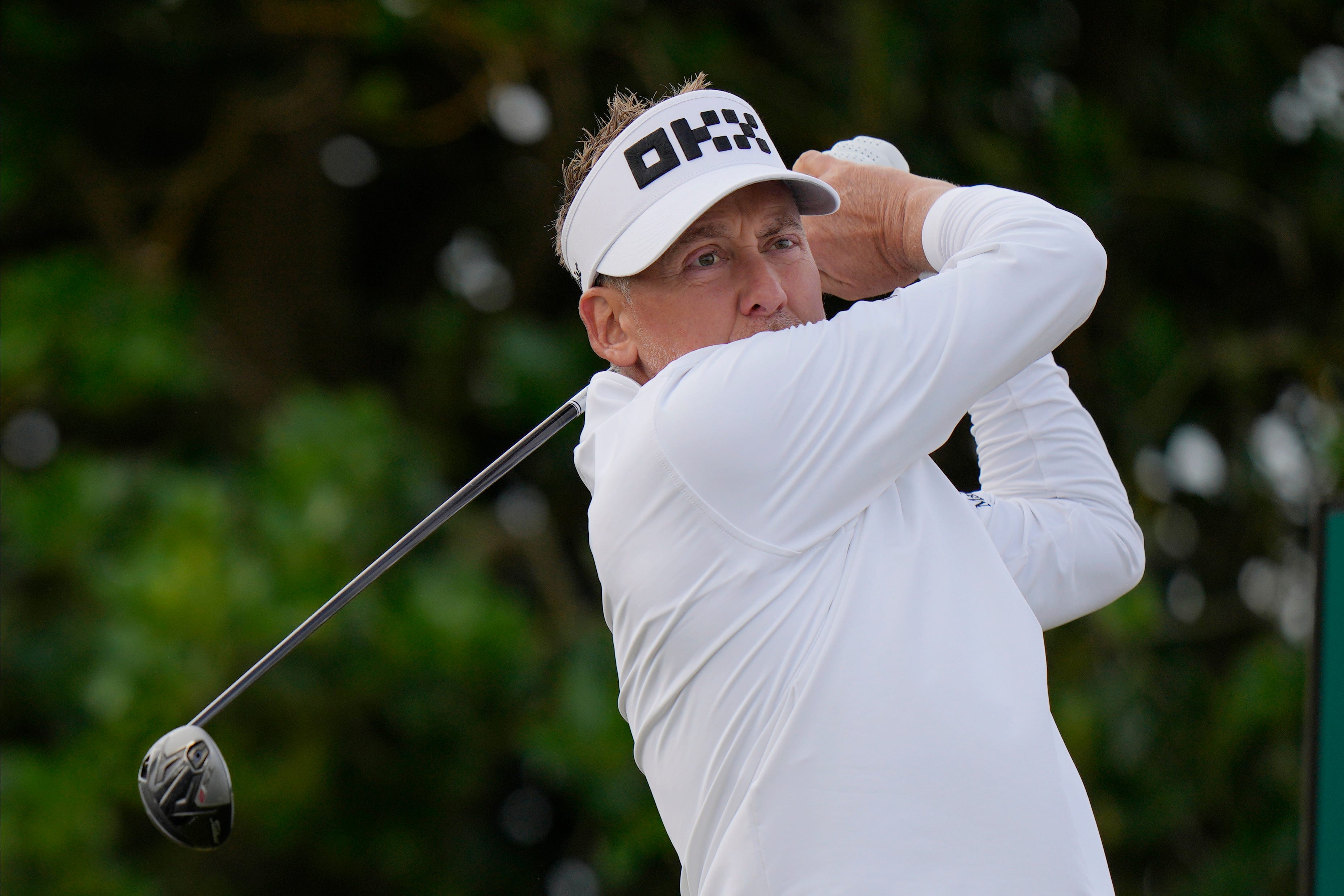 England's Ian Poulter plays from the 3rd tee during the first round of the British Open golf championship on the Old Course at St Andrews, Scotland, Thursday, July 14, 2022. The Open Championship returns to the home of golf on July 14-17 , 2022, to celebrate the 150th edition of the sport's oldest championship, which dates to 1860 and was first played at St Andrews in 1873. (AP Photo/Alastair Grant)